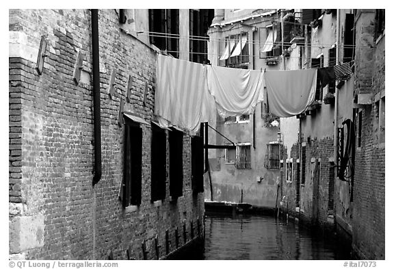 Clothelines and canal in a popular quarter, Castello. Venice, Veneto, Italy (black and white)