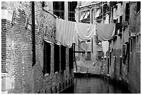Clothelines and canal in a popular quarter, Castello. Venice, Veneto, Italy (black and white)
