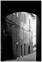 Archway and narrow street. Siena, Tuscany, Italy (black and white)