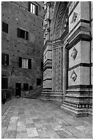 Small square besides the Duomo. Siena, Tuscany, Italy ( black and white)