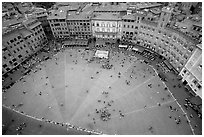 Medieval Piazza Del Campo with paving divided into nine sectors to represent Council of Nine.. Siena, Tuscany, Italy (black and white)