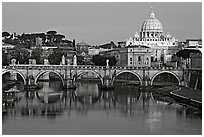 Ponte Sant'Angelo over the Tiber, and Basilica San Pietro, sunrise. Vatican City ( black and white)