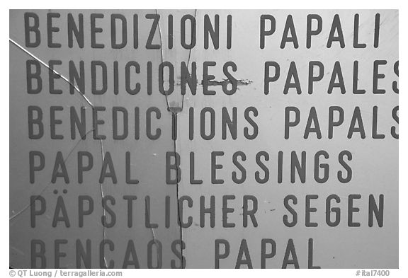 Papal Blessings sign in many languages. Vatican City (black and white)