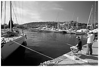 Fishing in the yacht harbor, Agropoli. Campania, Italy ( black and white)