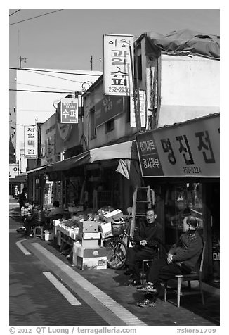 Shopkeepers and storefronts. Daegu, South Korea (black and white)