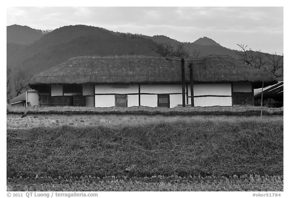 Straw roofed house. Hahoe Folk Village, South Korea (black and white)