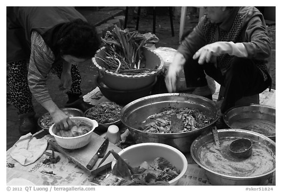 Women preparing kim chee. Gyeongju, South Korea (black and white)