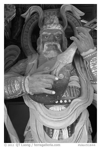 Wooden statue with musical instrument, Bulguk-sa. Gyeongju, South Korea (black and white)