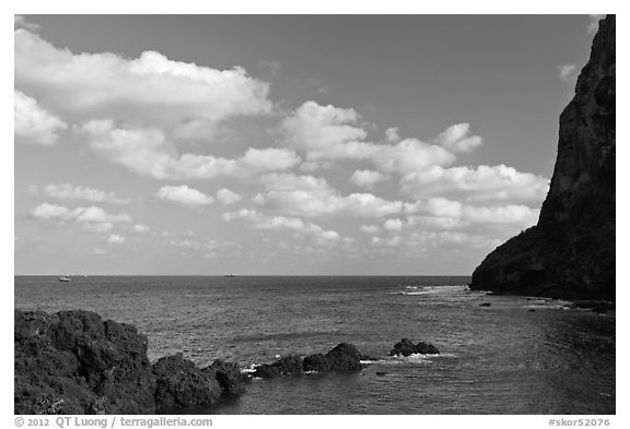 Coastline, and cliff, Seongsang Ilchulbong. Jeju Island, South Korea (black and white)