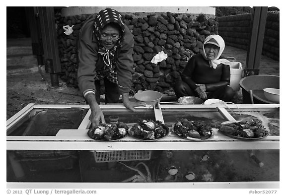 Haeneyo women selling seafood. Jeju Island, South Korea