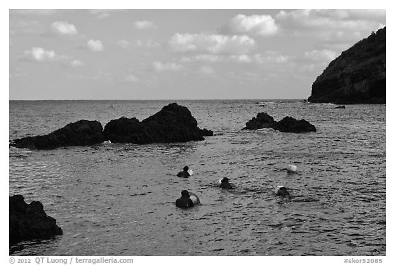 Haeneyo women swimming in cove. Jeju Island, South Korea