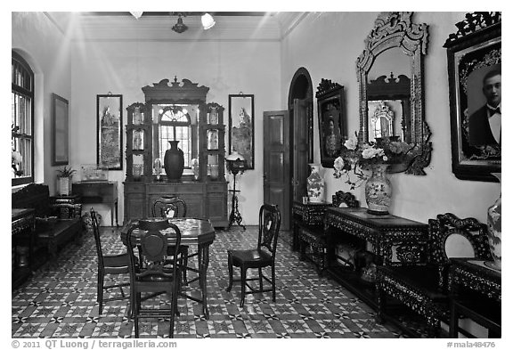 Room with furniture inside Pinang Peranakan Mansion. George Town, Penang, Malaysia (black and white)