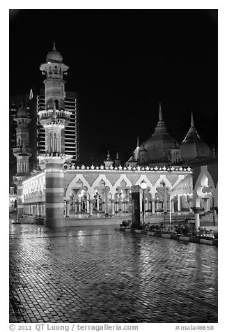 Masjid Jamek and reflections at night. Kuala Lumpur, Malaysia (black and white)