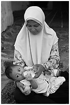 Mother and infant, St Paul Hill. Malacca City, Malaysia (black and white)