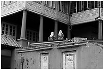 Stadthuys detail with two women. Malacca City, Malaysia (black and white)