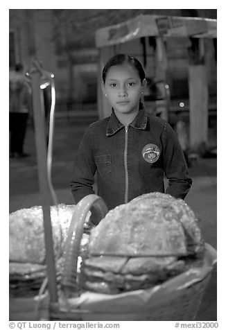 Young street food vendor by night. Guadalajara, Jalisco, Mexico (black and white)