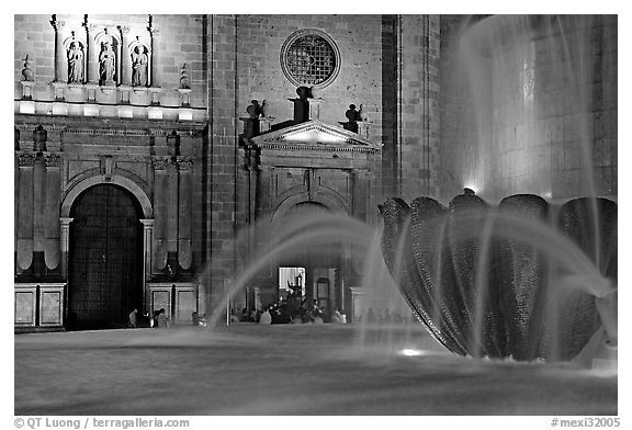 Fountain and cathedral wall by night. Guadalajara, Jalisco, Mexico (black and white)