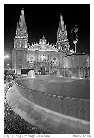 Fountain on Plazza de los Laureles and Cathedral by night. Guadalajara, Jalisco, Mexico (black and white)