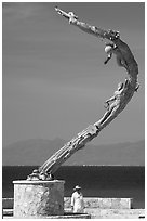 Sculpture called Los Milenios by Fernando Banos on waterfront, Puerto Vallarta, Jalisco. Jalisco, Mexico (black and white)