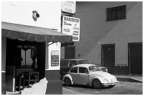 Restaurant at a street corner and Mexico made Wolskwagen bug, Puerto Vallarta, Jalisco. Jalisco, Mexico (black and white)