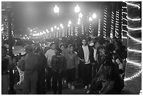 Crowds on the Malecon at night, Puerto Vallarta, Jalisco. Jalisco, Mexico (black and white)
