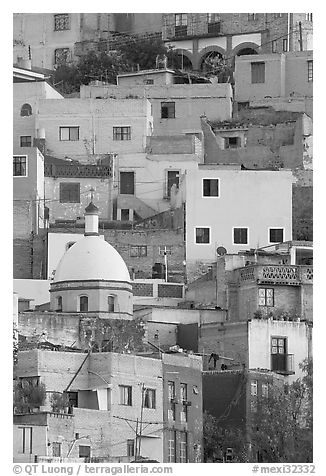 Houses painted with bright colors on a steep hillside. Guanajuato, Mexico (black and white)