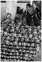 Woman selling Traditional puppets. Guanajuato, Mexico (black and white)