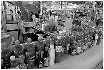 Chili bottles at a booth in Mercado Hidalgo. Guanajuato, Mexico (black and white)