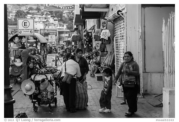Women packing souvenirs for sale, Ensenada. Baja California, Mexico (black and white)