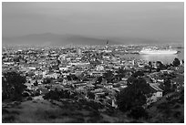 Panoramic view of city from hills at sunset, Ensenada. Baja California, Mexico (black and white)