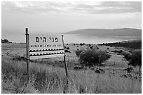 Sign marking sea level and the Lake Tiberias. Israel ( black and white)