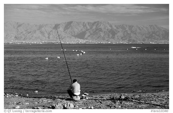 Fishing in the Red Sea, Eilat. Negev Desert, Israel (black and white)
