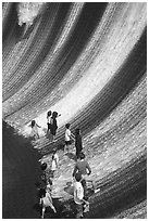 Visitors interacting with water feature. Expo 2020, Dubai, United Arab Emirates ( black and white)