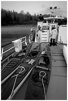 Kayaks loaded on the deck of Glacier Bay Lodge concession boat. Glacier Bay National Park, Alaska (black and white)