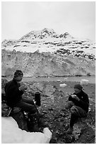 Eating breakfast in front of Lamplugh Glacier. Glacier Bay National Park, Alaska (black and white)