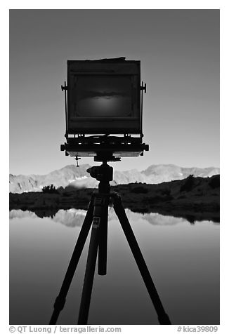 Large format camera with inverted image of mountain landscape on ground glass, Dusy Basin. Kings Canyon National Park, California