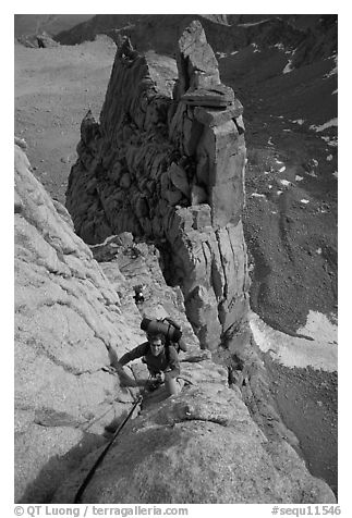 Man climbing East face of Mt Whitney. Sequoia National Park, California