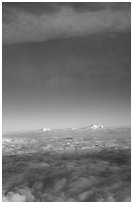 Mt Foraker and Denali emerge from sea of clouds. Denali National Park ( black and white)