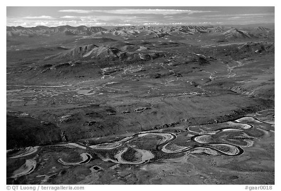 Aerial view of plain with meandering Alatna river and mountains. Gates of the Arctic National Park (black and white)