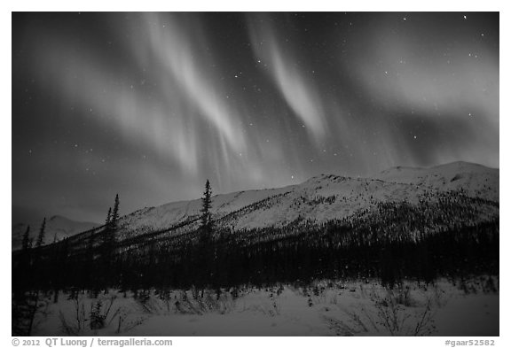 Colorful aurora curtains over Brooks Range. Gates of the Arctic National Park (black and white)