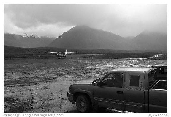 Truck waiting for airplane, Anaktuvuk Pass Airport. Gates of the Arctic National Park (black and white)