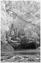 Ice cave at the base of Lamplugh glacier. Glacier Bay National Park, Alaska, USA. (black and white)