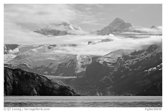 Rugged peaks of Fairweather range rising abruptly above the Bay. Glacier Bay National Park (black and white)