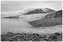 Stream flowing into Tarr Inlet, and Margerie Glacier. Glacier Bay National Park, Alaska, USA. (black and white)