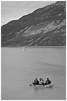 Skiff and tour boat in Reid Inlet. Glacier Bay National Park, Alaska, USA. (black and white)