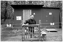 Food and gear cache in the campground, protected from bears by an electric fence. Katmai National Park, Alaska, USA. (black and white)
