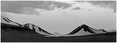 Snow-covered mountains with pink dusk sky. Katmai National Park (Panoramic black and white)