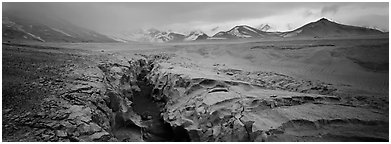 Stormy landscape with ash-covered valley and mountains. Katmai National Park (Panoramic black and white)