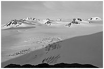 Snow-covered glacier and Harding Ice field peaks, sunrise. Kenai Fjords National Park, Alaska, USA. (black and white)