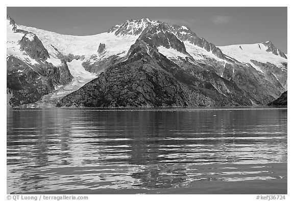 Rippled refections of peaks and glaciers, Northwestern Fjord. Kenai Fjords National Park (black and white)